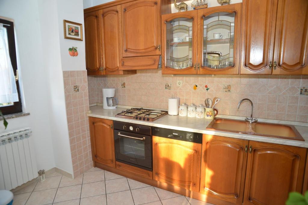 Kuchyň nebo kuchyňský kout v ubytování Apartment Perić