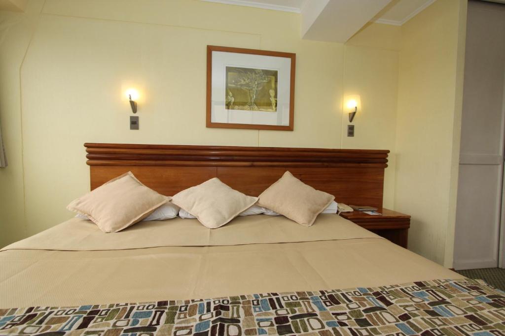 Postel nebo postele na pokoji v ubytování Gala Hotel