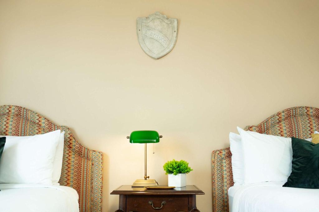 Postel nebo postele na pokoji v ubytování Hotel Viata