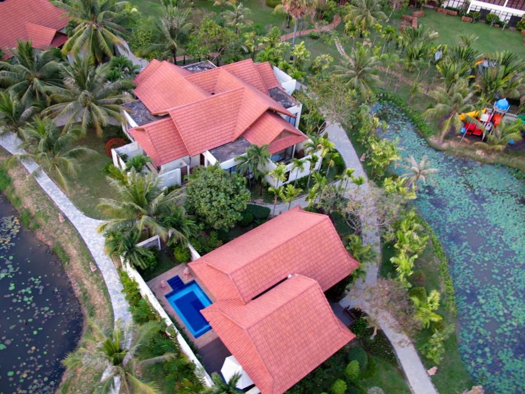 an overhead view of a house with red roof at Palace Residence & Villa Siem Reap in Siem Reap