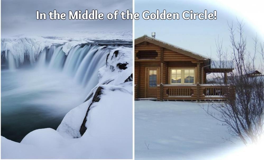 a cabin in the middle of the golden circle in the snow at Log Cabin at White River in Kiðjaberg