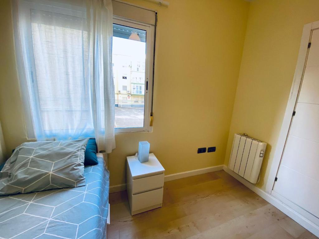 Posteľ alebo postele v izbe v ubytovaní Bright Beach House Grupo AC Gestion