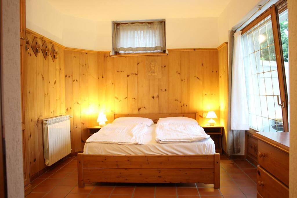 Posteľ alebo postele v izbe v ubytovaní Carlo B Garten Ferienwohnung EG