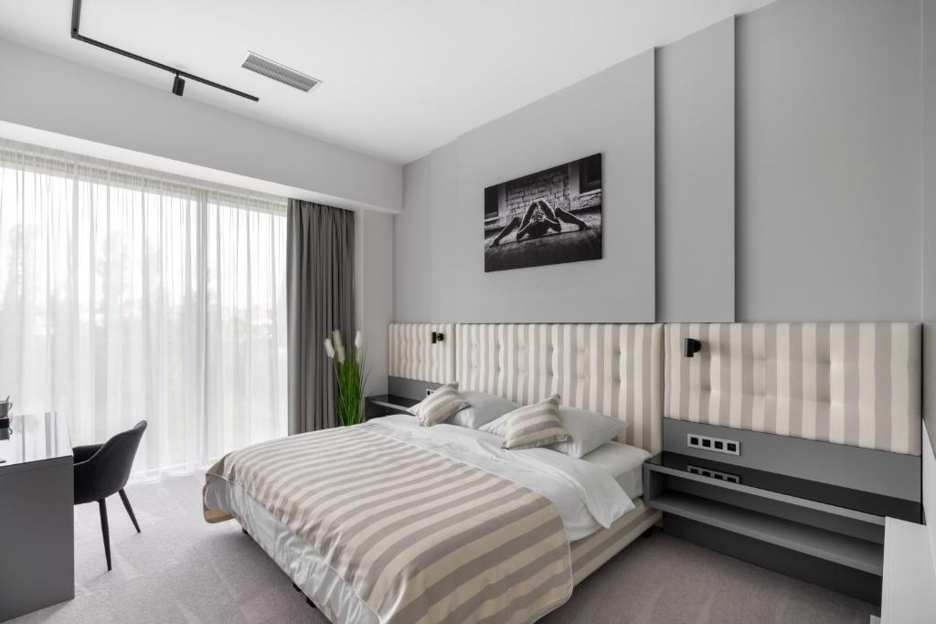 Postel nebo postele na pokoji v ubytování Port Karolina Luxury Residence