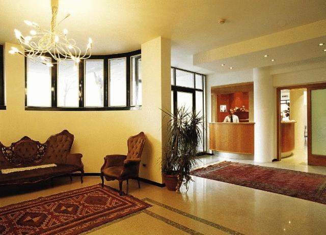 Posezení v ubytování Hotel La Cascata