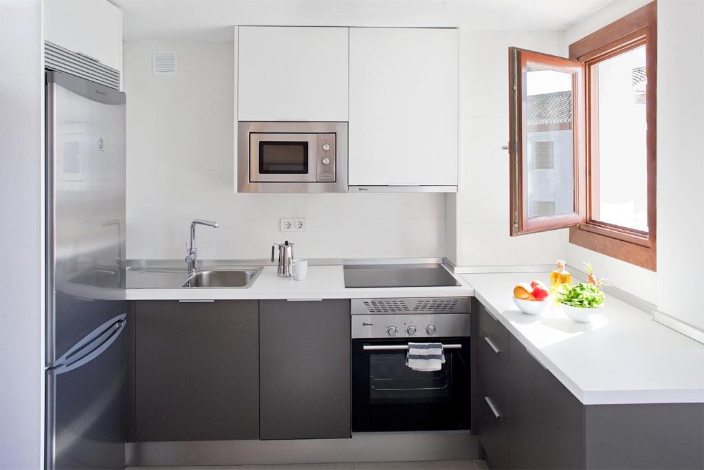 Kuchyň nebo kuchyňský kout v ubytování Smart Suites Albaicin