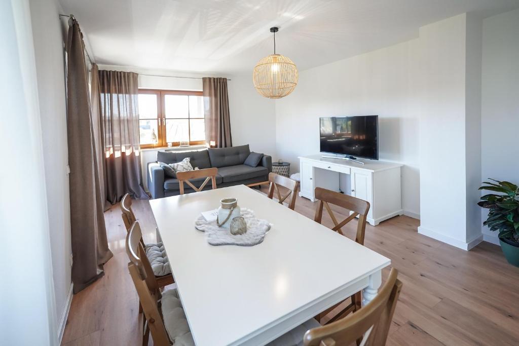 Posezení v ubytování Ferienwohnung "Wie dahoam"