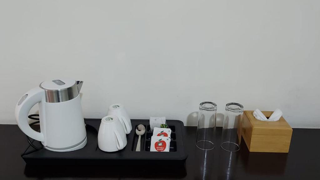 Příslušenství pro přípravu čaje a kávy v ubytování Hotel Grand View