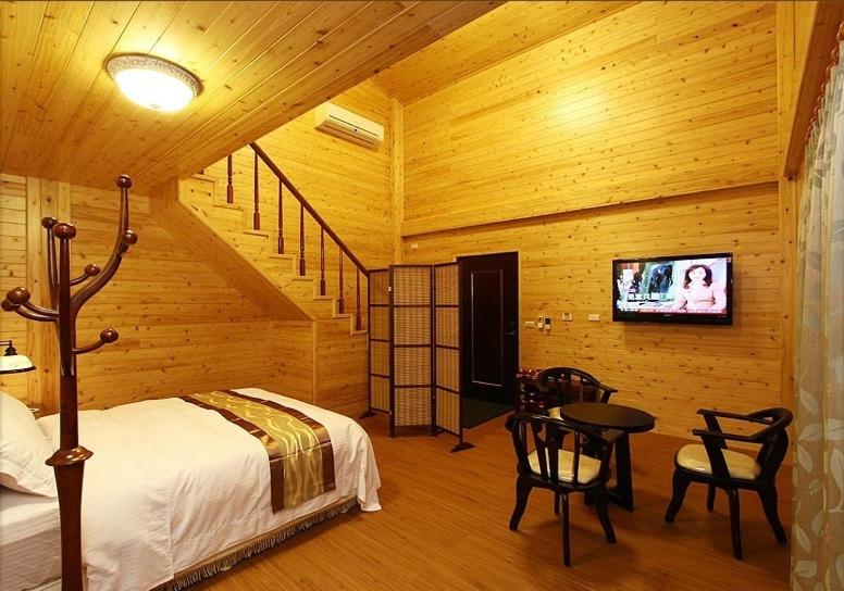 TV a/nebo společenská místnost v ubytování Zhuyuan Ju B&B