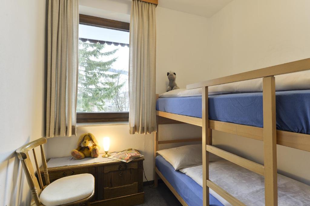 Postel nebo postele na pokoji v ubytování Hotel Bergheim