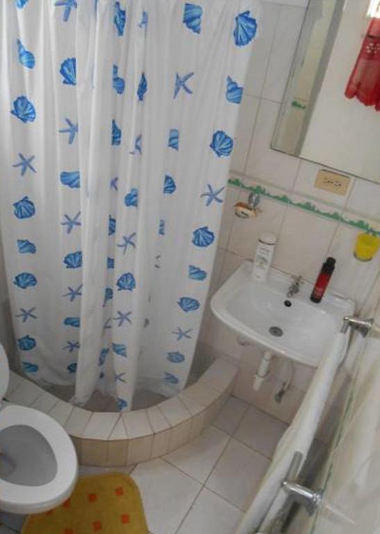 Koupelna v ubytování Lucy Rooms