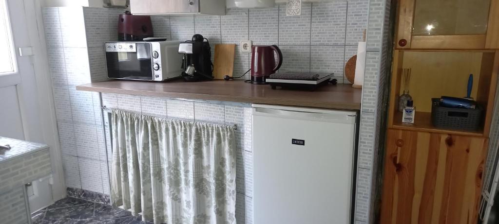 Kuchyňa alebo kuchynka v ubytovaní Ov152 Apartman