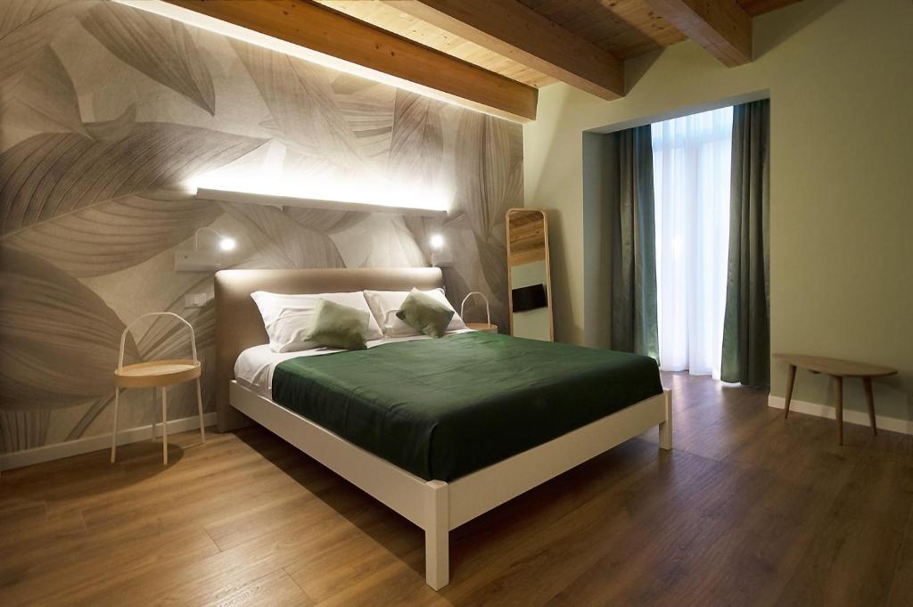 Ένα ή περισσότερα κρεβάτια σε δωμάτιο στο B&b Porta Arpana