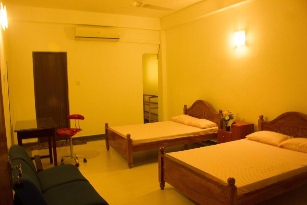 Postel nebo postele na pokoji v ubytování Hotel Senora