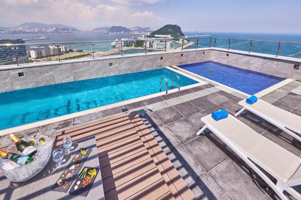 an overhead view of a swimming pool on top of a building at Citadines Connect Hari Busan in Busan