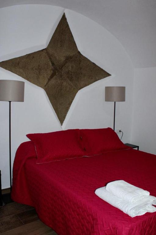Postel nebo postele na pokoji v ubytování Cueva Ramón