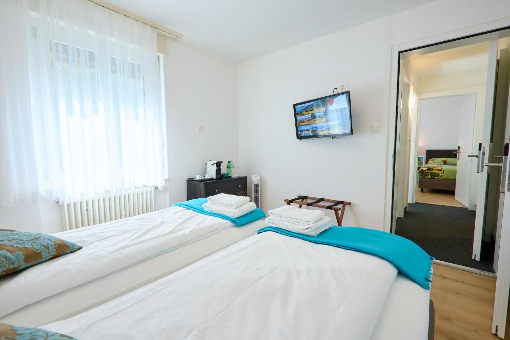 Postel nebo postele na pokoji v ubytování Hotel Sonnenberg