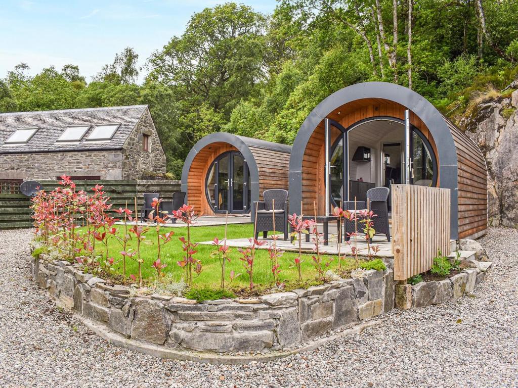 a circular house with a garden in front of it at Sunart - Uk39865 in Salen