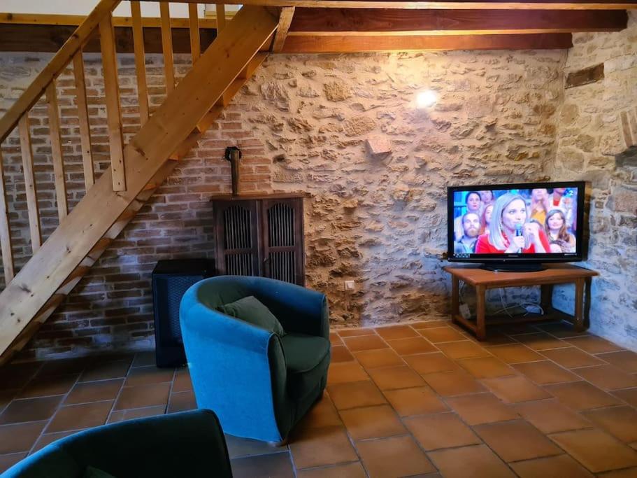 Telewizja i/lub zestaw kina domowego w obiekcie Maison chaleureuse près de Rocamadour