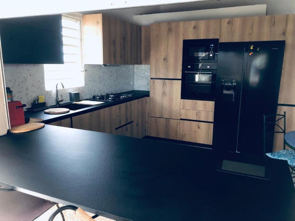 Kuchyň nebo kuchyňský kout v ubytování LEN'HOUSE