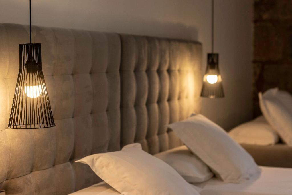 Кровать или кровати в номере Habitaciones Apartamento B&B Plaza Nueva 8
