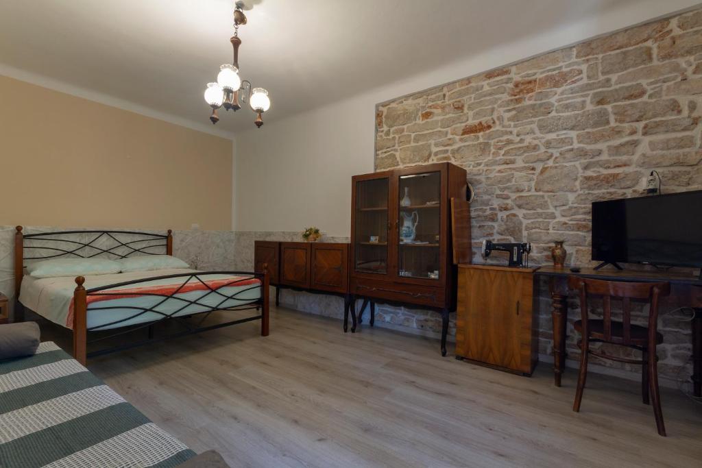 Posteľ alebo postele v izbe v ubytovaní Holiday stone house