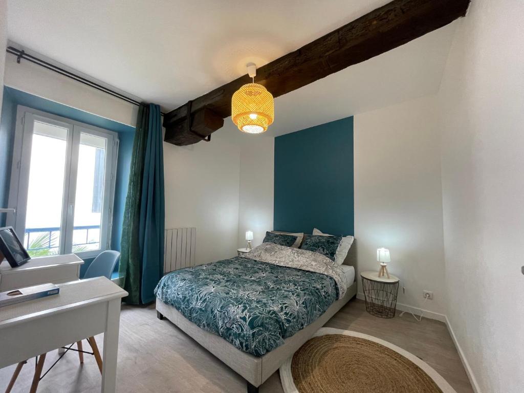 Posteľ alebo postele v izbe v ubytovaní L'escapade de Rompsay Cosy & Moderne