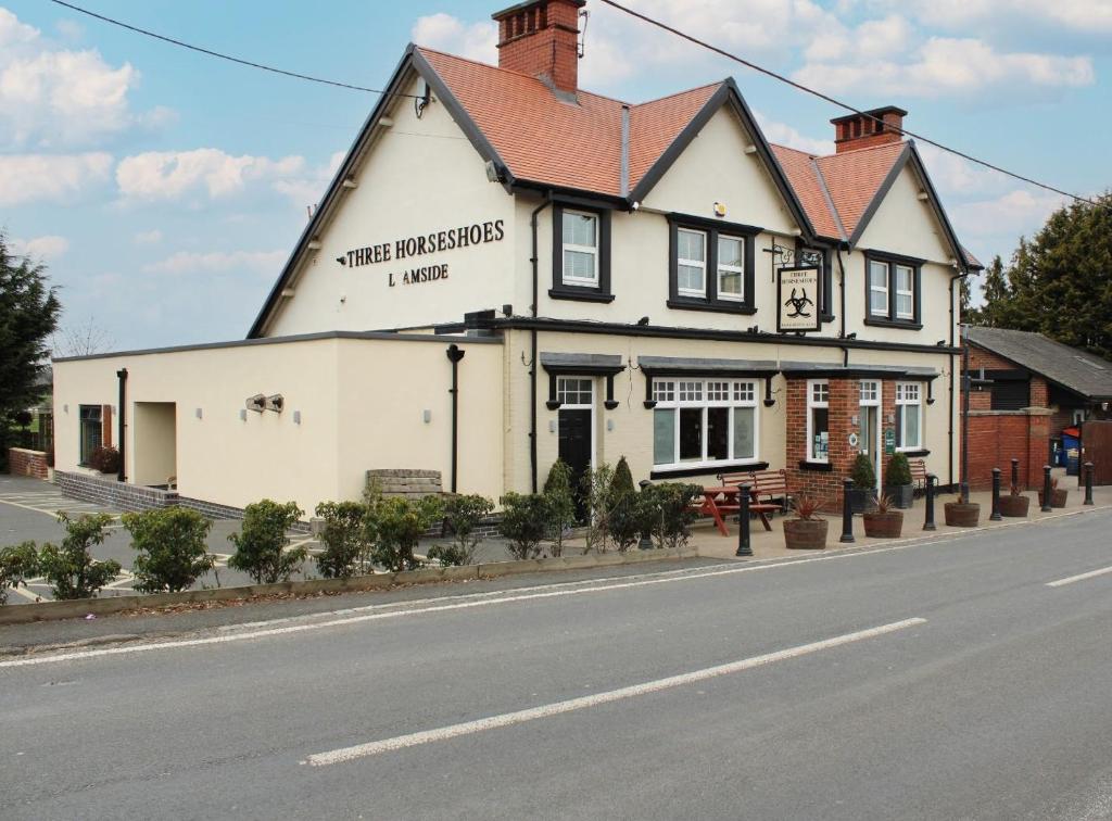 a building on the side of a road at Three Horseshoes Leamside in Houghton le Spring