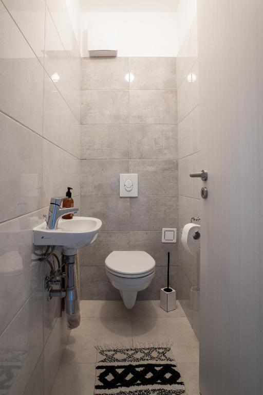 Koupelna v ubytování Cesar Apartman