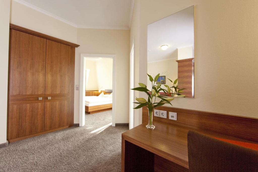 Postel nebo postele na pokoji v ubytování Hotel Weis