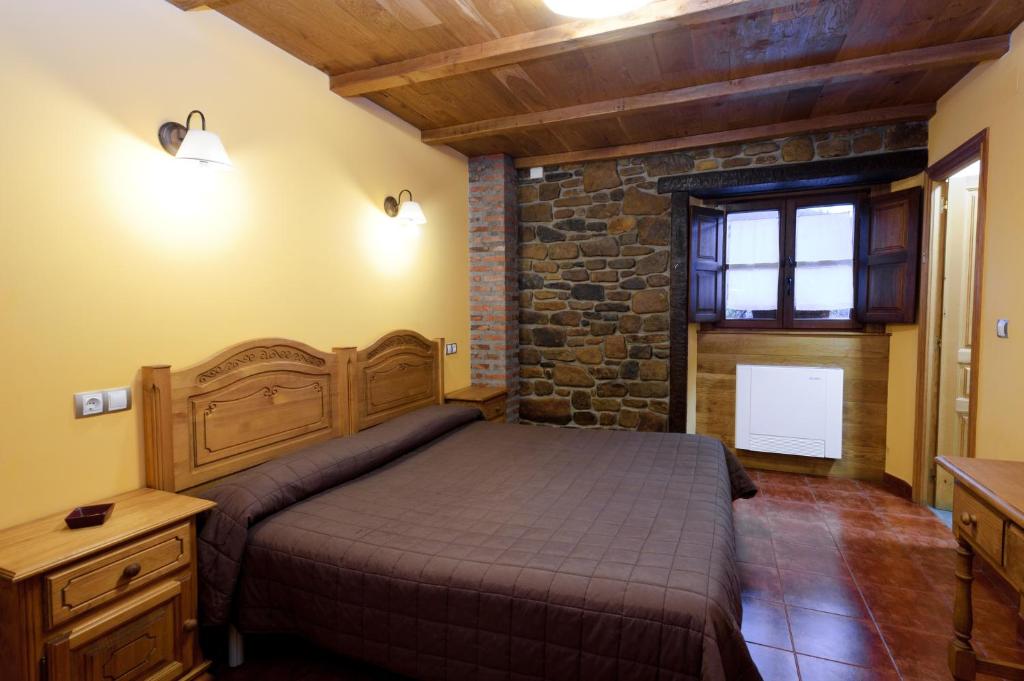 เตียงในห้องที่ Posada Casa Rosalia