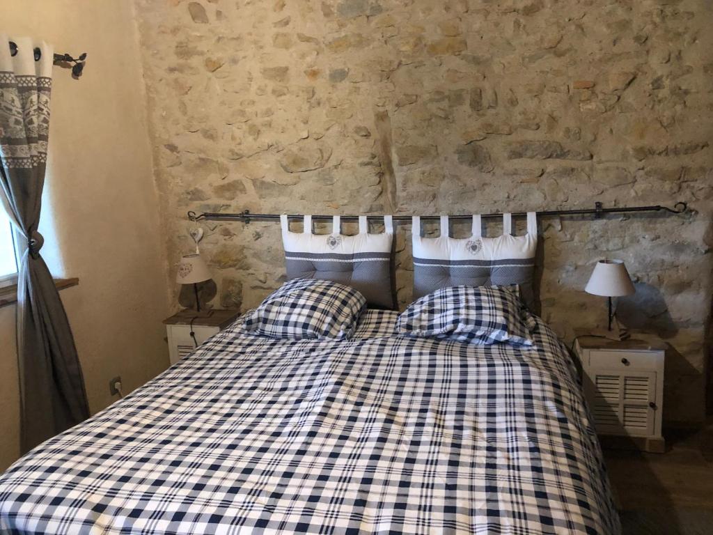 Postel nebo postele na pokoji v ubytování Le domaine des Terres
