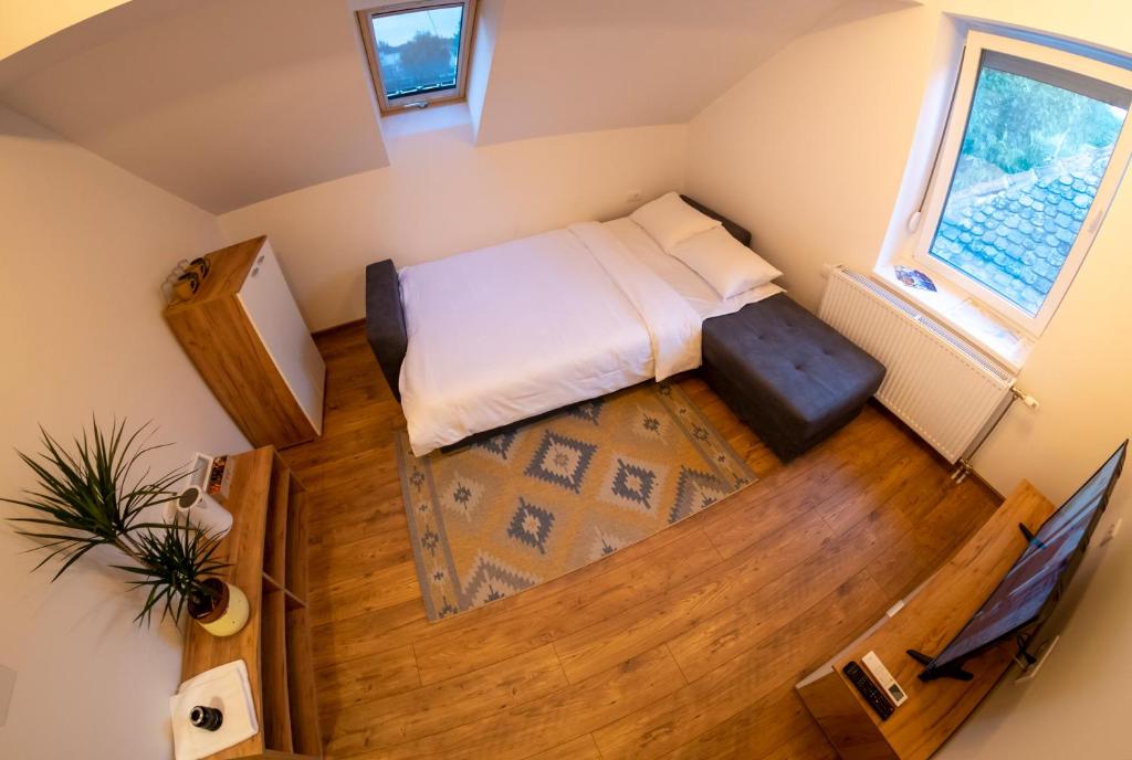 Postel nebo postele na pokoji v ubytování Petlov salaš rooms