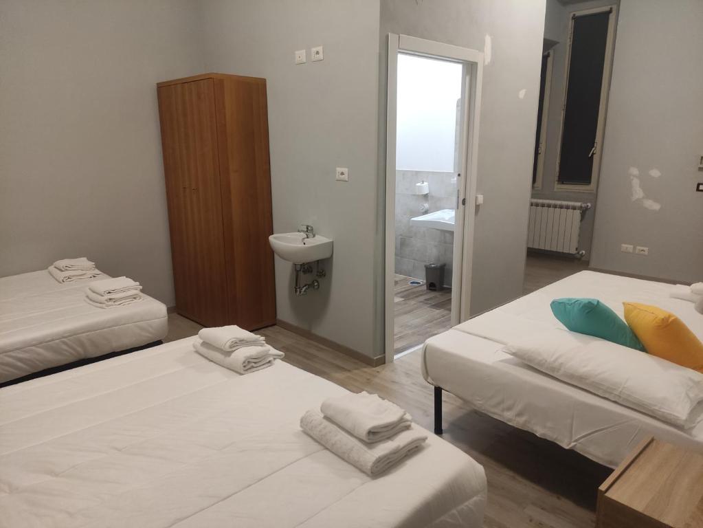 Postel nebo postele na pokoji v ubytování Hotel Big Bang