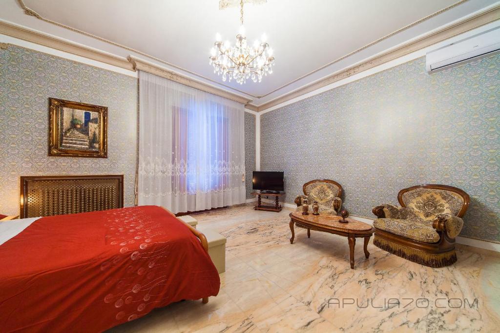 Postel nebo postele na pokoji v ubytování Apulia 70 Holidays - Suites & Experiences