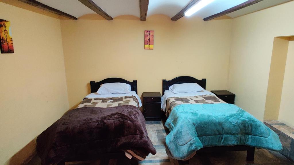 Postel nebo postele na pokoji v ubytování Wake Up Hostel