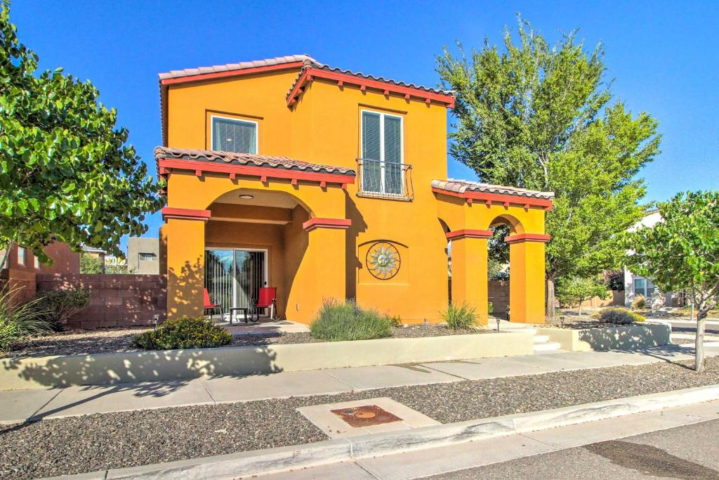 een geel huis met een rood dak bij Updated ABQ Getaway Walk to Netflix Studios! in Albuquerque
