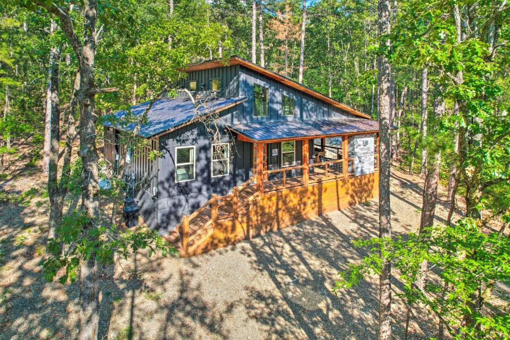 an overhead view of a house in the woods at Chic Broken Bow Cabin with Hot Tub and Gas Grill! in Broken Bow