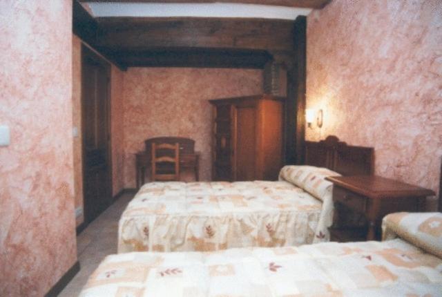 Postel nebo postele na pokoji v ubytování Hotel Rural Bidean