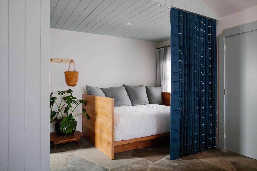 Postel nebo postele na pokoji v ubytování Daunts Albatross Motel