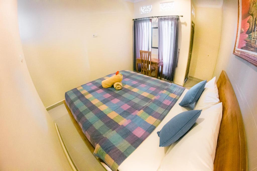 Postel nebo postele na pokoji v ubytování Witantra house