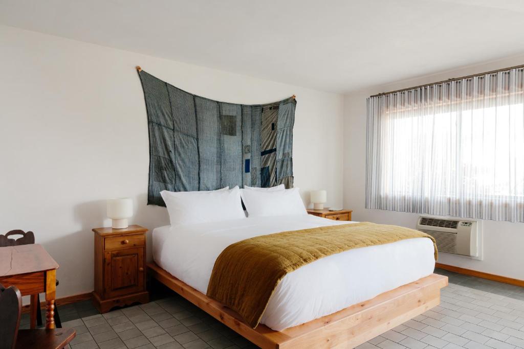 Postel nebo postele na pokoji v ubytování Daunts Albatross Motel