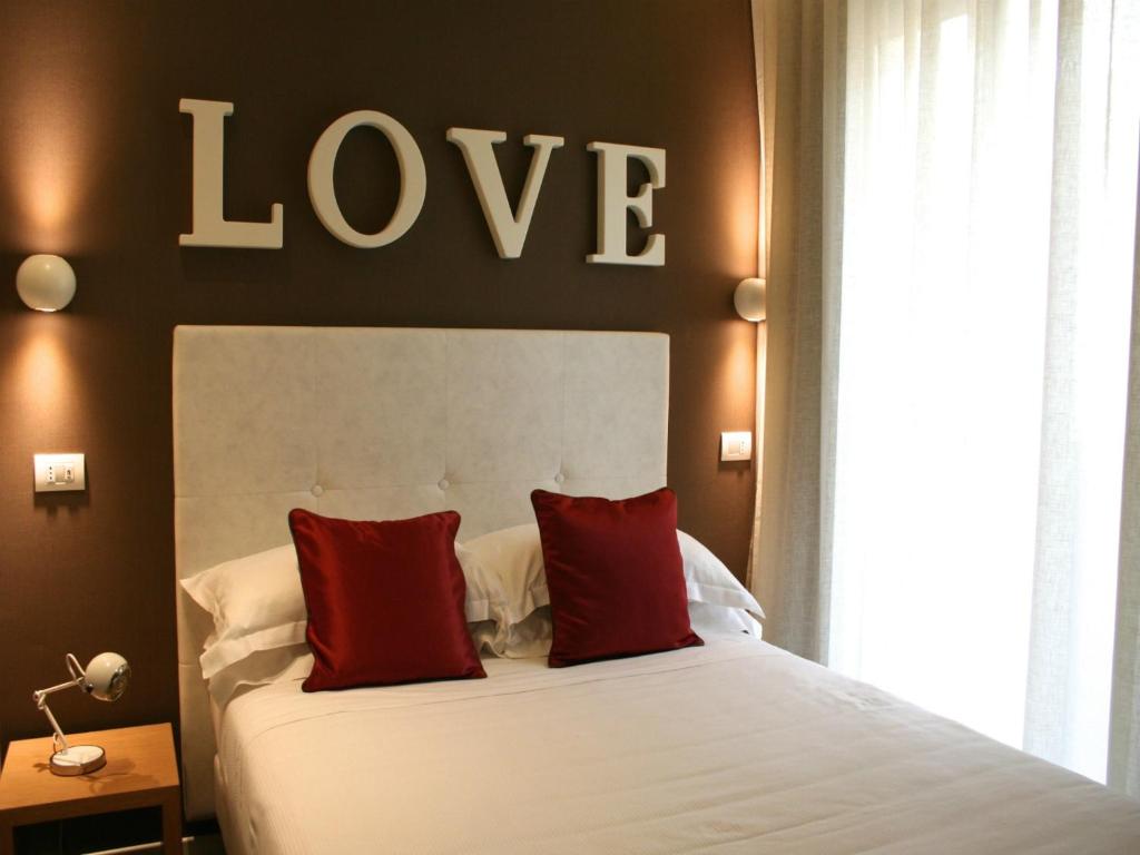 Postel nebo postele na pokoji v ubytování Hotel Select Suites & Spa - Apartments