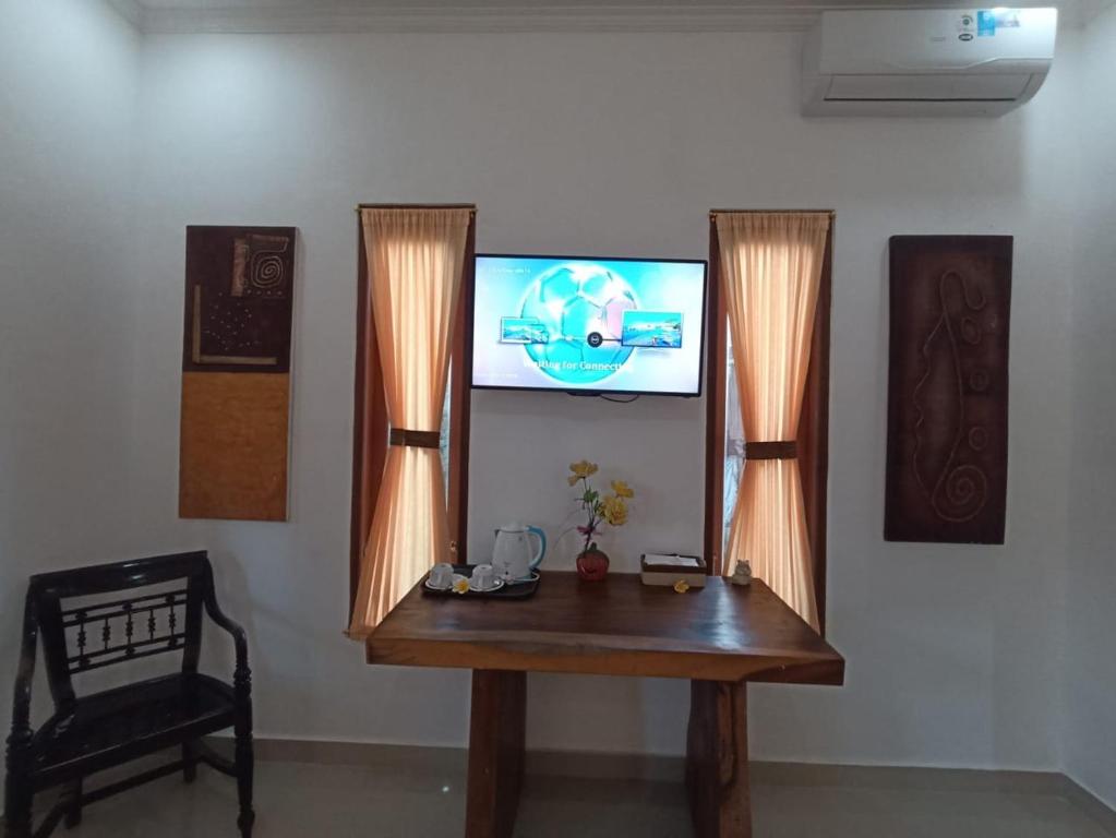 TV a/nebo společenská místnost v ubytování Bupala Guest House