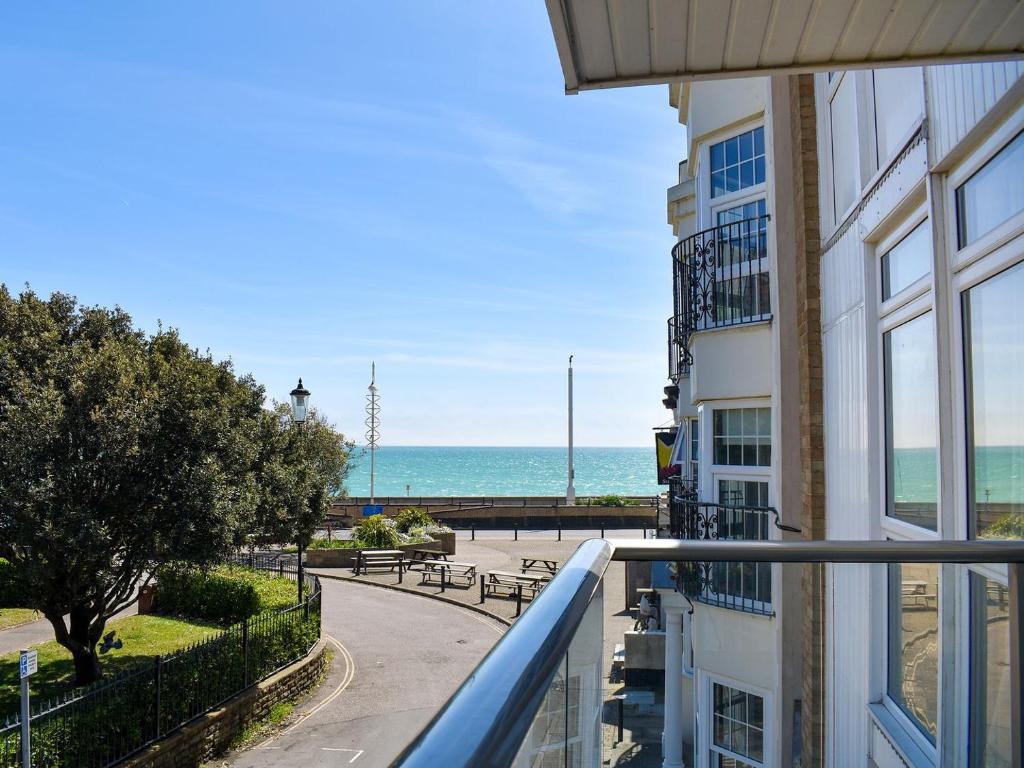 a balcony of a building with a view of the ocean at Sea Vista in Bognor Regis