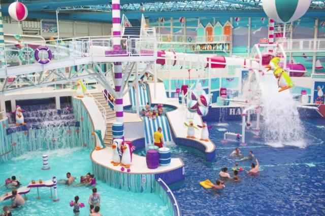a group of people in a water park on a cruise ship at Haven Craig Tara Holiday Park - GD's Caravan Hire in Ayr