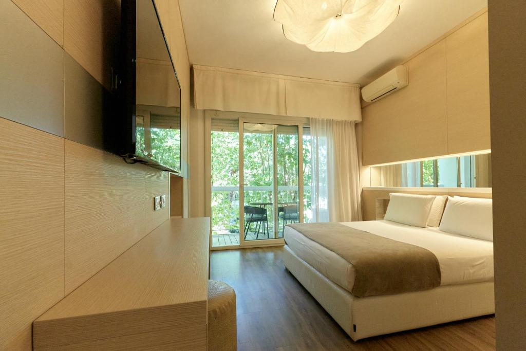 Postel nebo postele na pokoji v ubytování Hotel Saraceno Resort with Private Beach