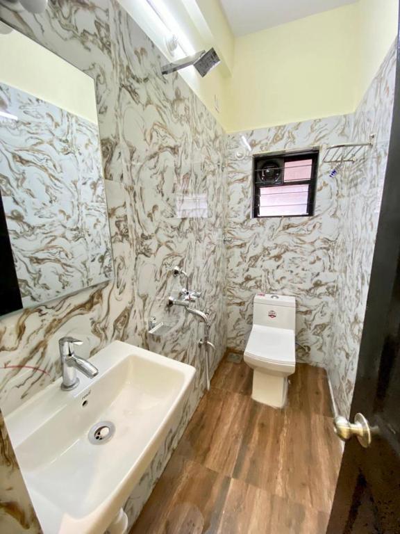 Koupelna v ubytování Prabhuvihar Residency