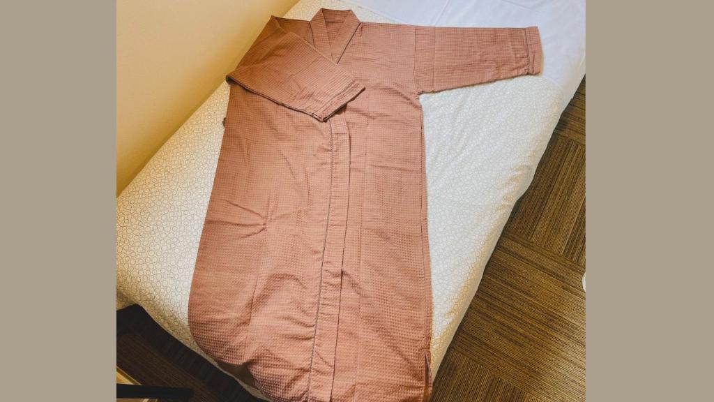 Postel nebo postele na pokoji v ubytování Hostel Inn Hashimoto
