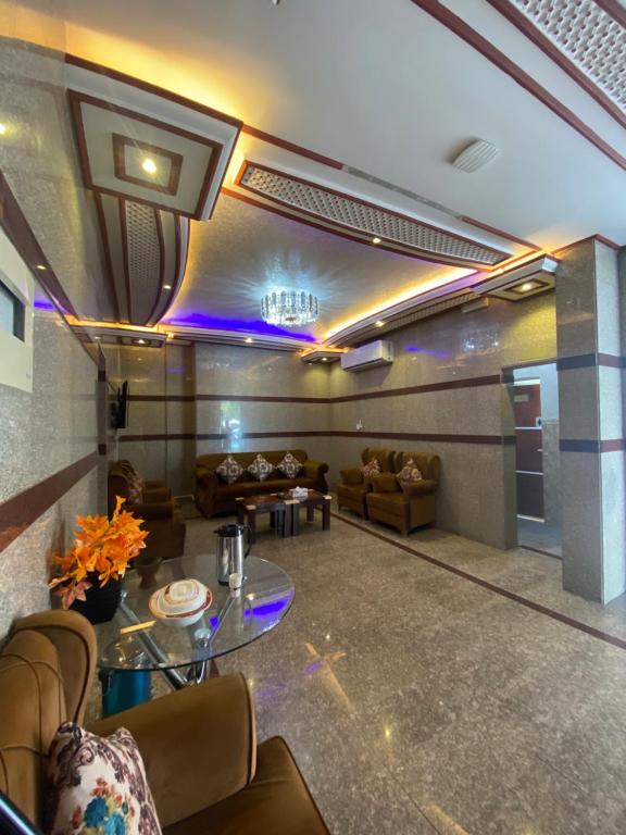 Posezení v ubytování ALJAWHARA INN HOTEL